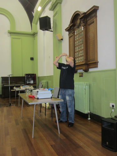 Magician, Douglas Maddy swallowing a balloon